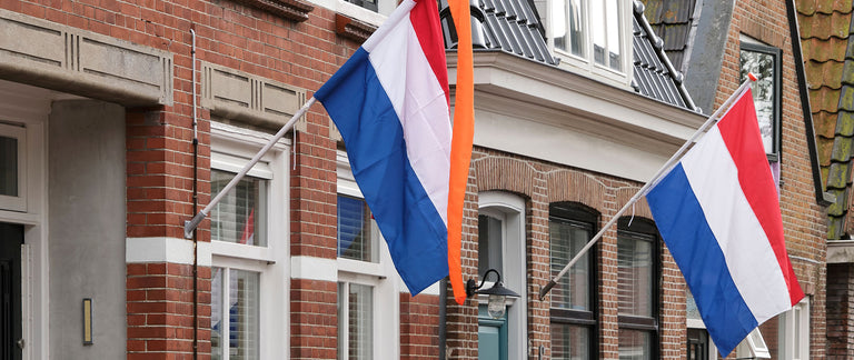 Hoe hang je een vlag op met vlaggenstokhouder?