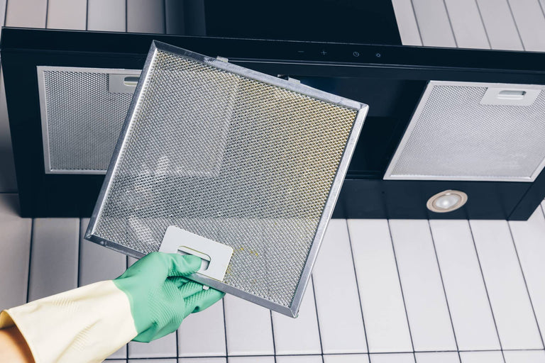 Een afzuigkapfilter schoonmaken of vervangen