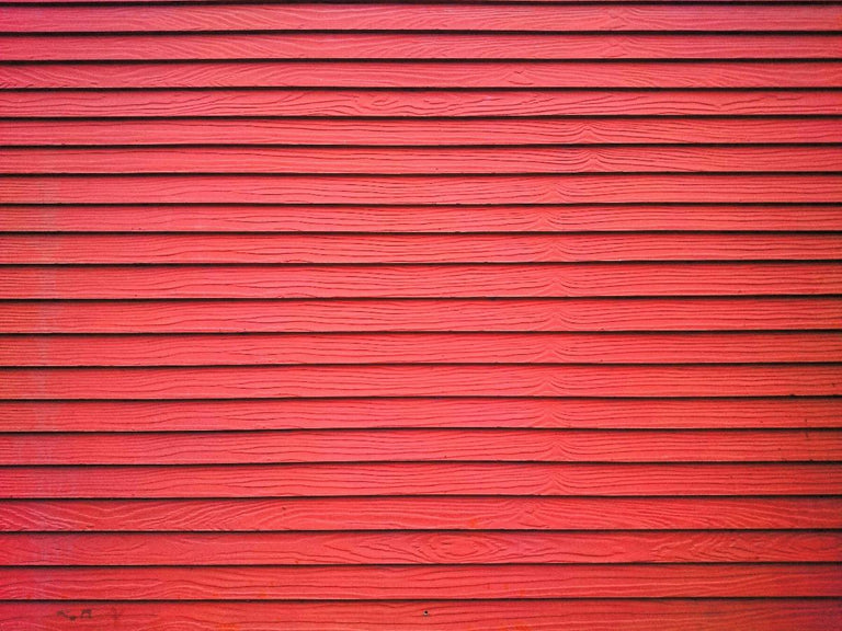 De gepotdekselde schutting is helemaal hip